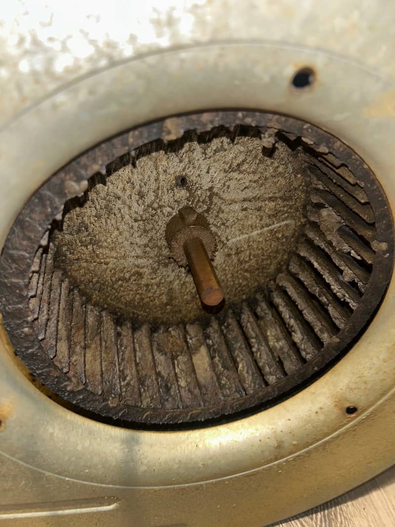 Dirty HVAC blower wheel before cleaning and UV purification install